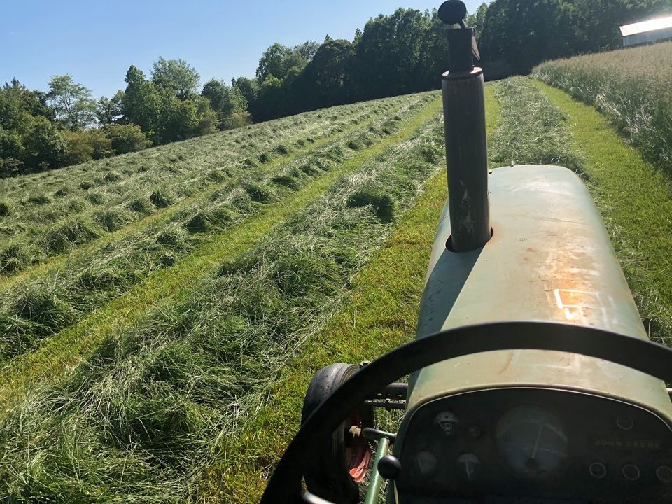 Hay stacked at night in the barn